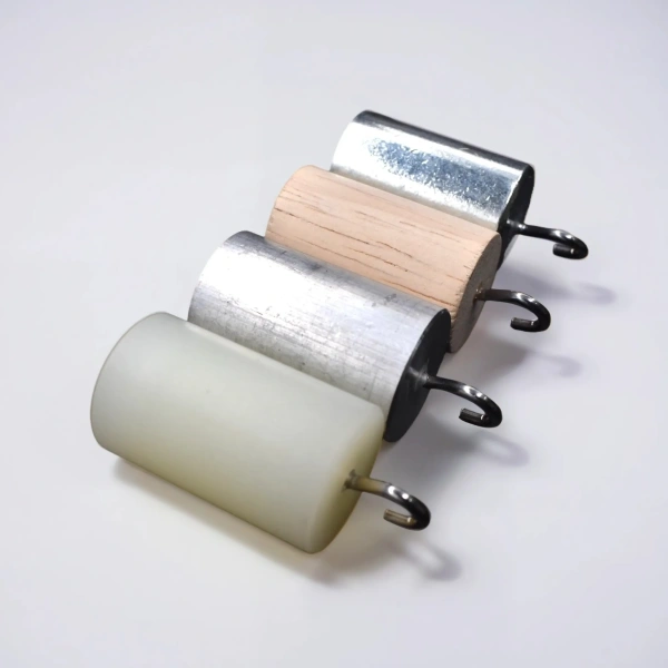 Набор тел равного объема (сталь, алюминий, пластик и дерево) цилиндры